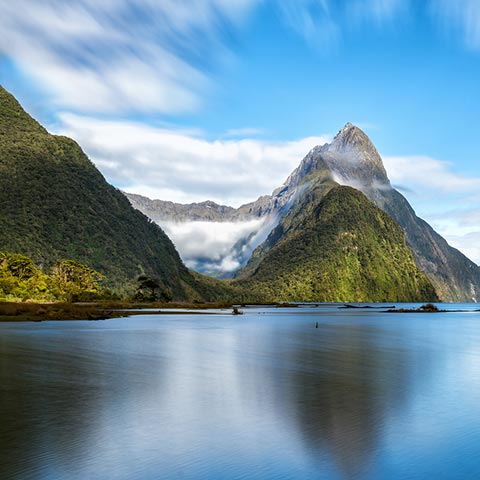 Stunning view of the glacier-carved fiords that can be explored on a New Zealand vacation